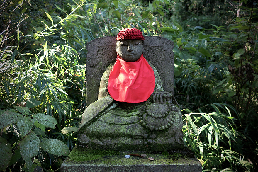 One of the 88 Jizo figures on pilgrimage hike at Takahata Fudo-san