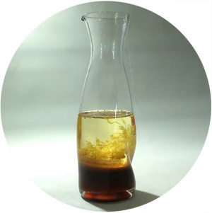 Photo of soy-lemon dressing in clear bottle