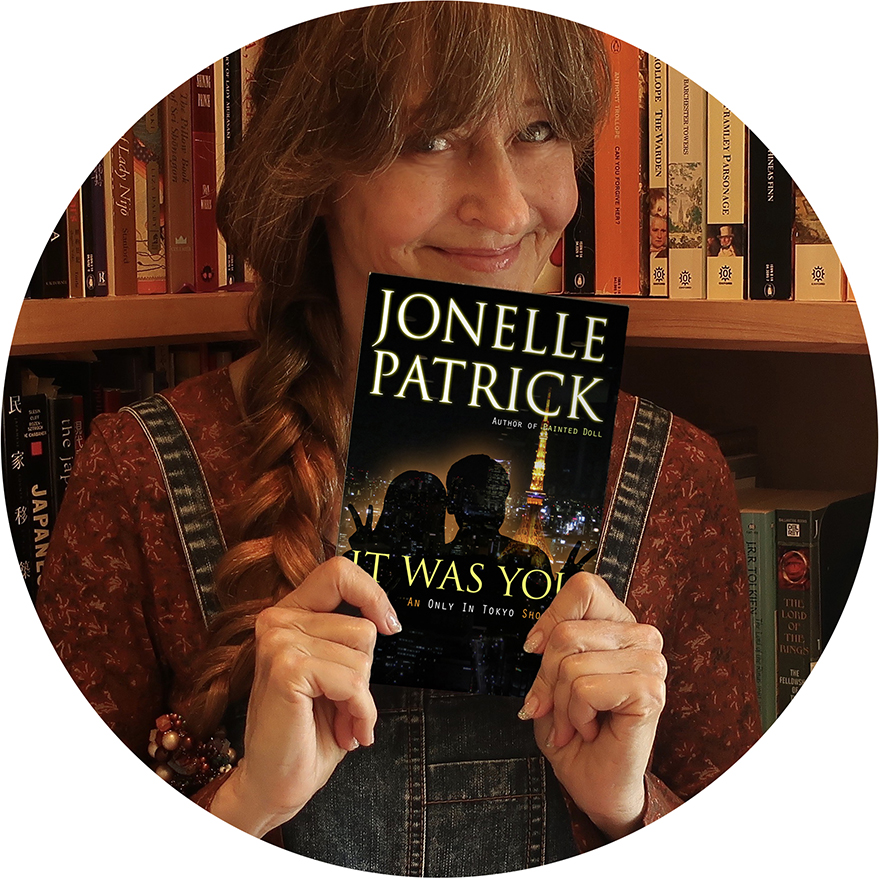 Author Jonelle Patrick with signed paperback book giveaway It Was You
