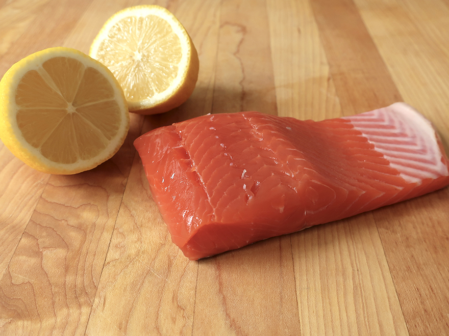 Salmon fillet with cut lemon