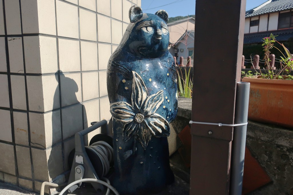 Artist-designed ceramic tanuki figure in Shigaraki