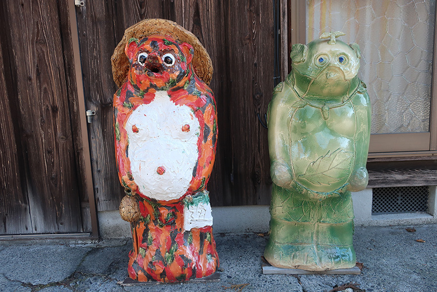 Artist-designed ceramic tanuki figures in Shigaraki