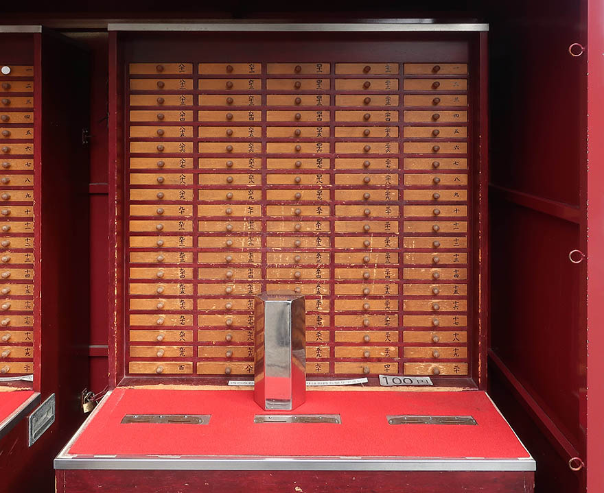 O-mikuji fortune stand at Senso-ji temple in Tokyo