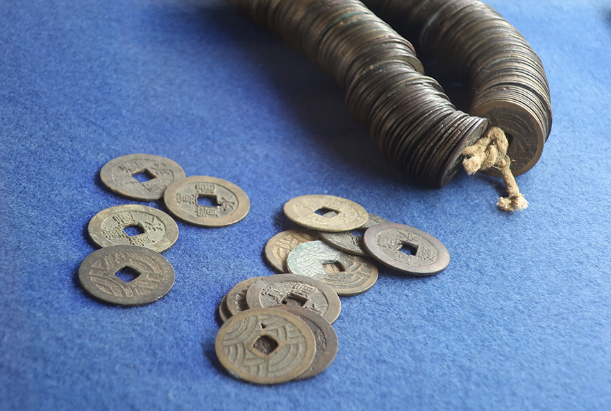 String of Edo Period coins at the Nomura Samurai Residence in Kanazawa