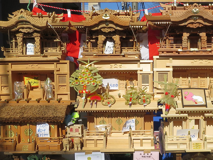Shrines carved from Yakushima cedar being sold at the Setagaya Boroichi flea market in Tokyo