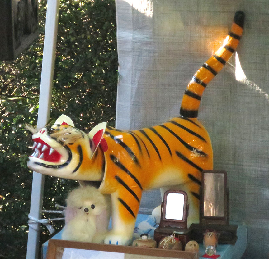 Bobble-hear tiger being sold at the Setagaya Boroichi flea market in Tokyo
