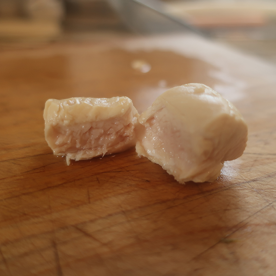 Chicken pieces cooked until slightly pink in the middle