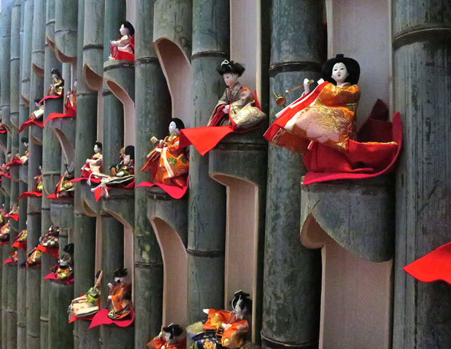 Katsuura Doll Festival hina matsuri thousands of dolls on bamboo display wall