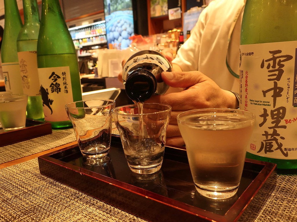 Pouring sake for a sake tasting