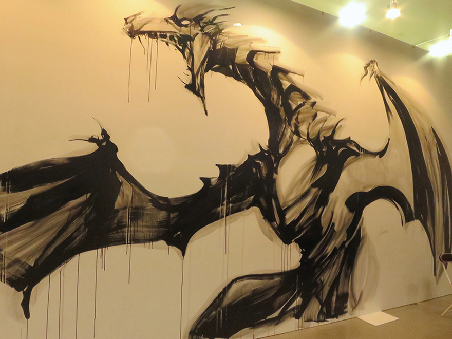 Ink painting mural of a dragon at Design Festa