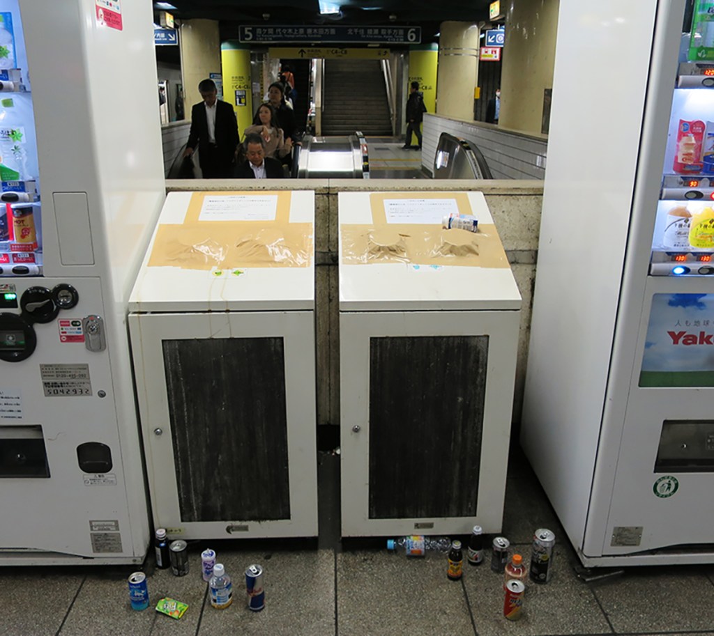 Taped-up recycling bins