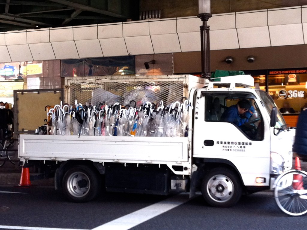 Dead umbrella collection truck