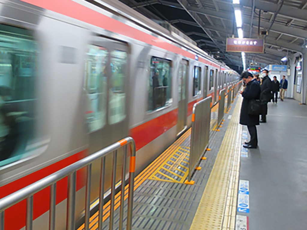 Tokyo subway train leaving station